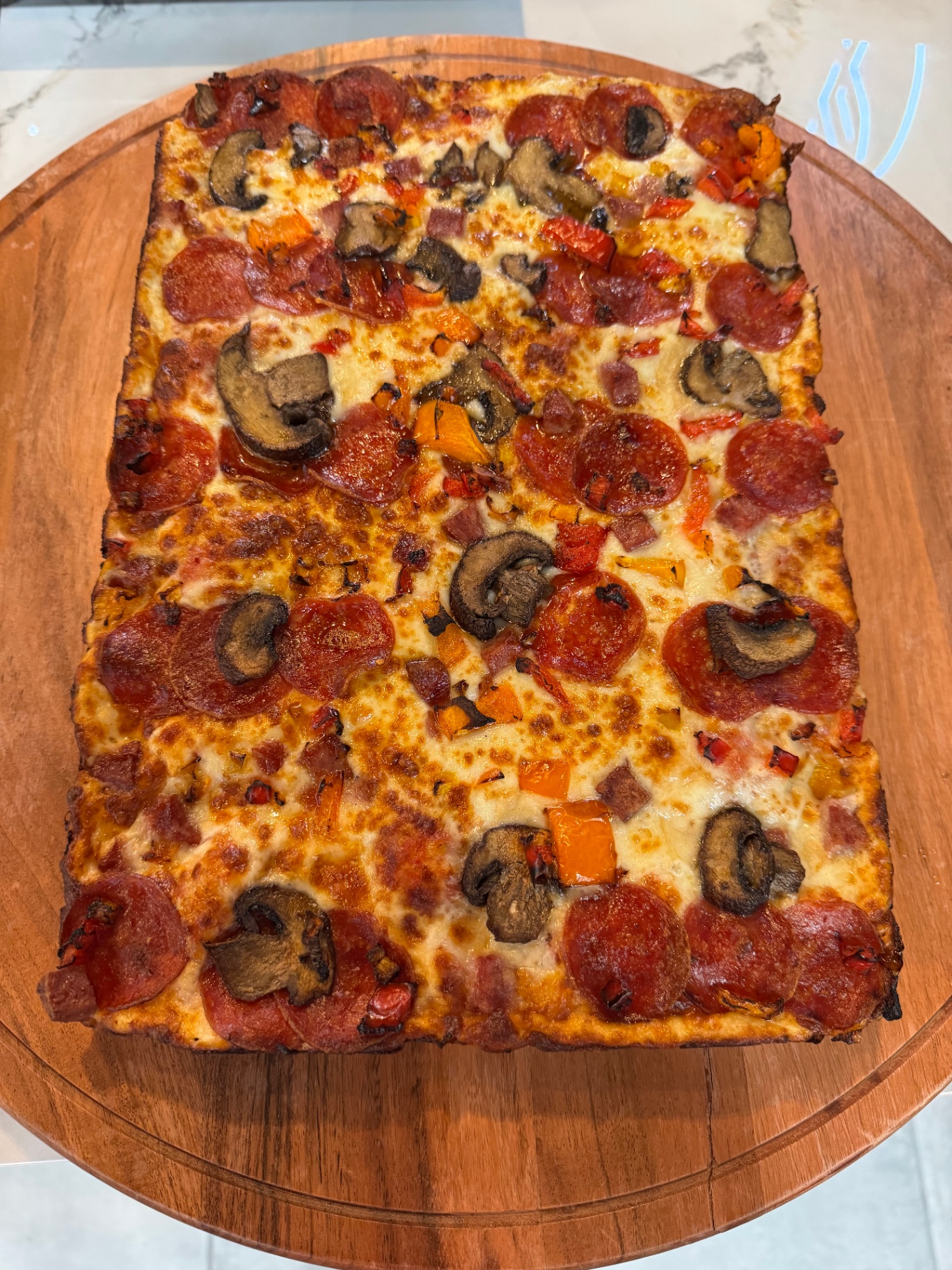 Detroit-style deep dish pizza fresh from the oven at Blaz'N Dough