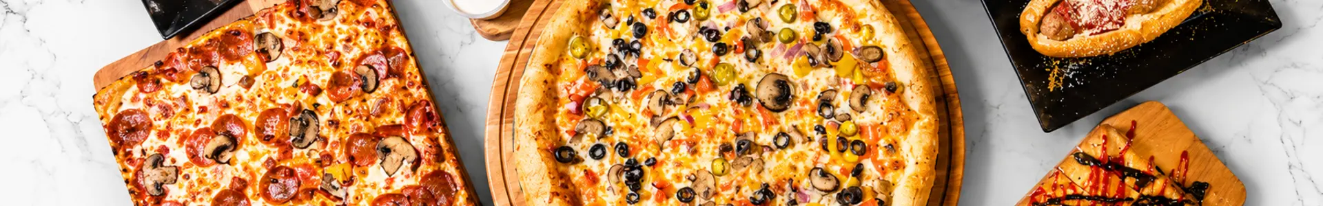 Blaz'N Dough menu spread with pizzas and sides